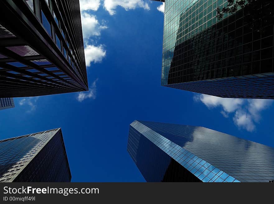 Lower manhattan buildings with blue sky on the background