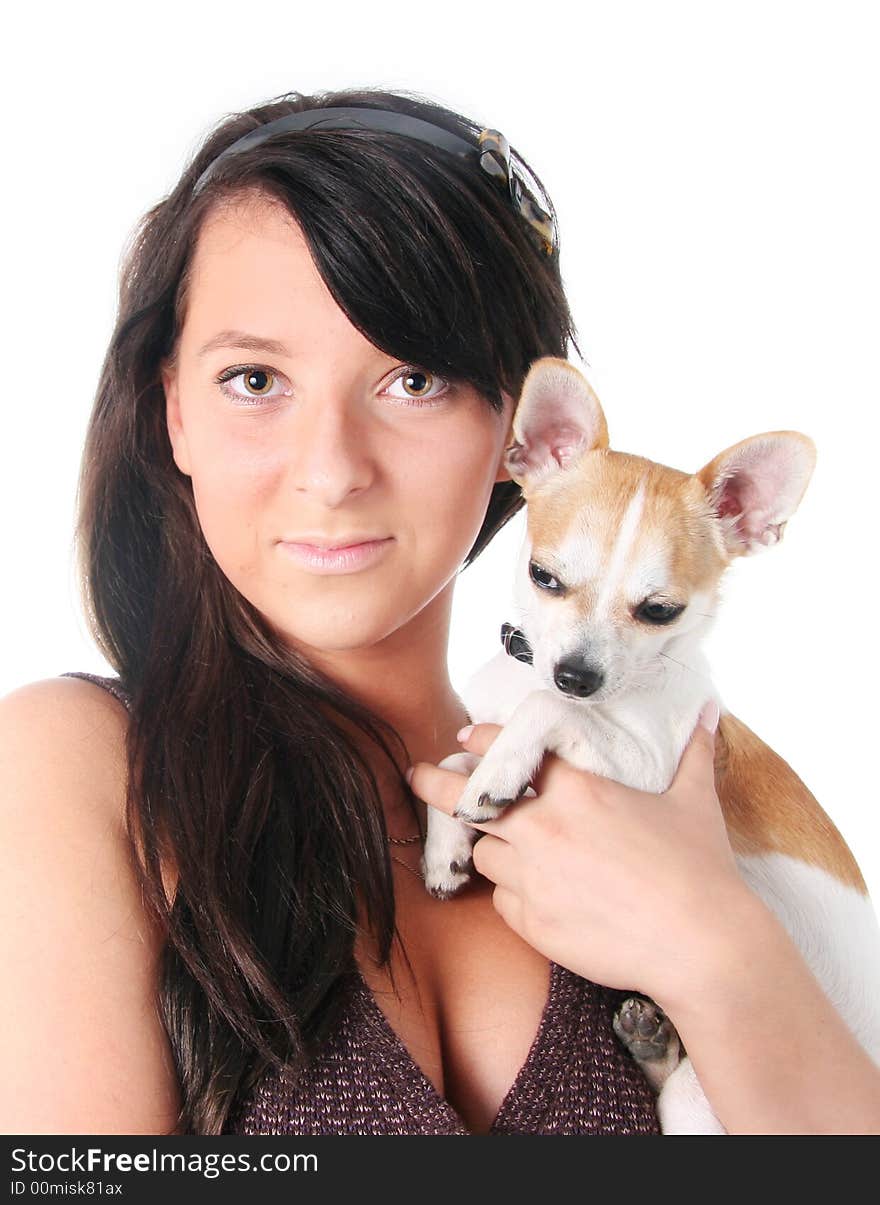 Girl with chihuahua isolated on white in a studio