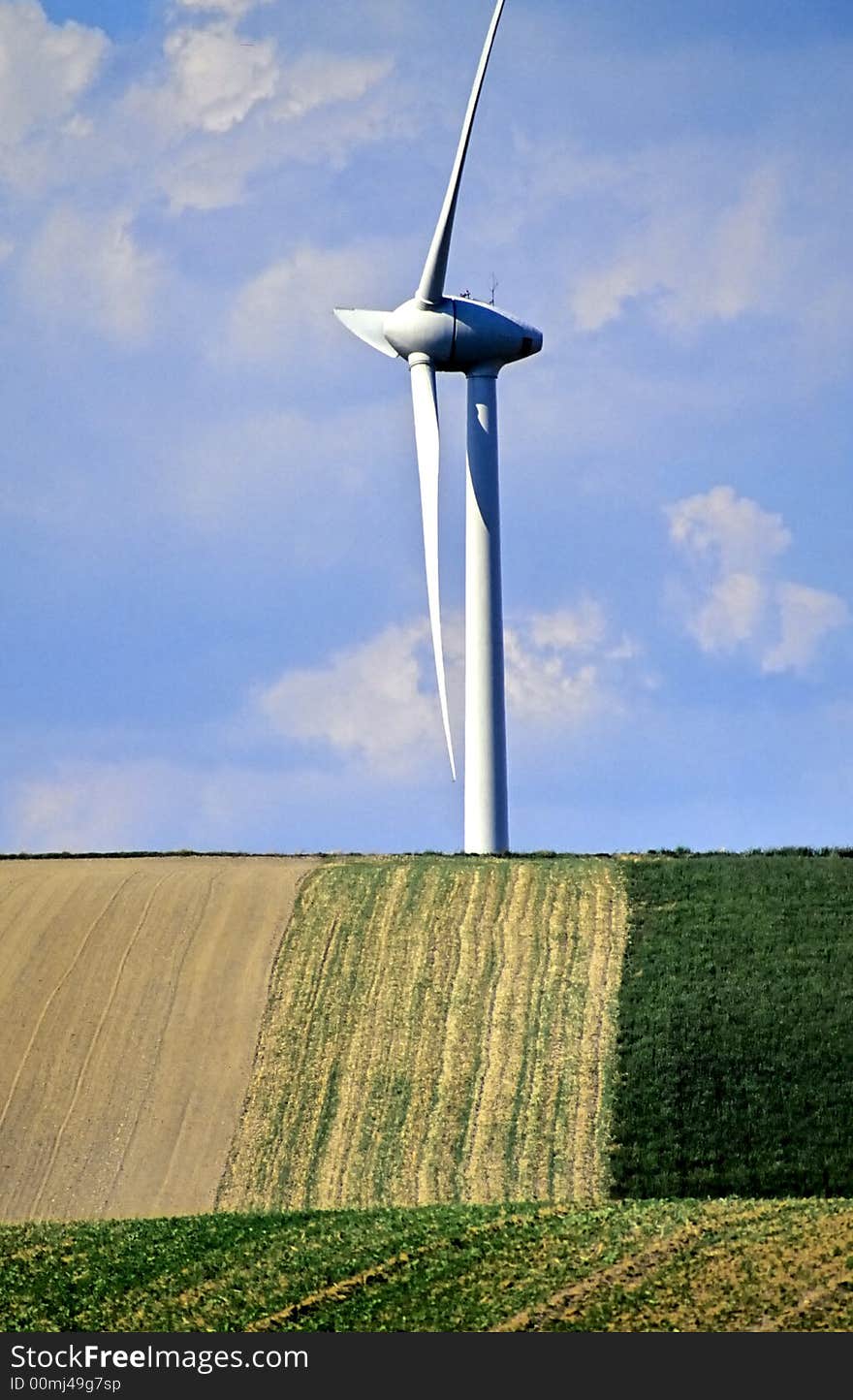 Windmill on the horizon with fields. Windmill on the horizon with fields