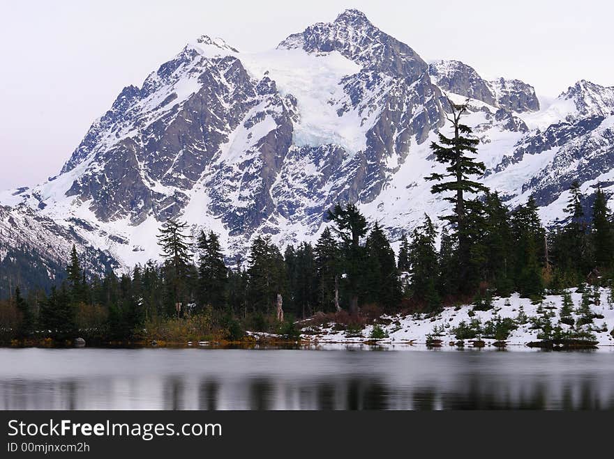 Picture Lake reflection of Mount Shuksan with snow. Picture Lake reflection of Mount Shuksan with snow