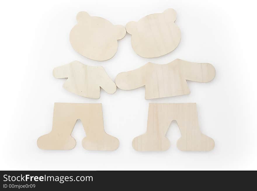 Boy and girl wooden teddies in love. Boy and girl wooden teddies in love