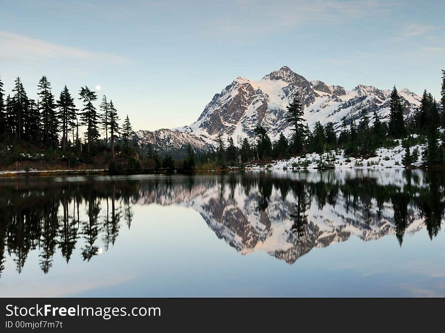 Picture Lake reflection of Mount Shuksan with snow. Picture Lake reflection of Mount Shuksan with snow