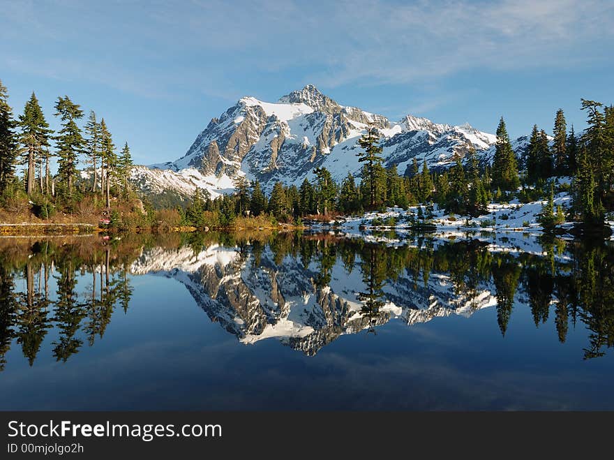 Picture Lake reflection of Mount Shuksan with snow. Picture Lake reflection of Mount Shuksan with snow