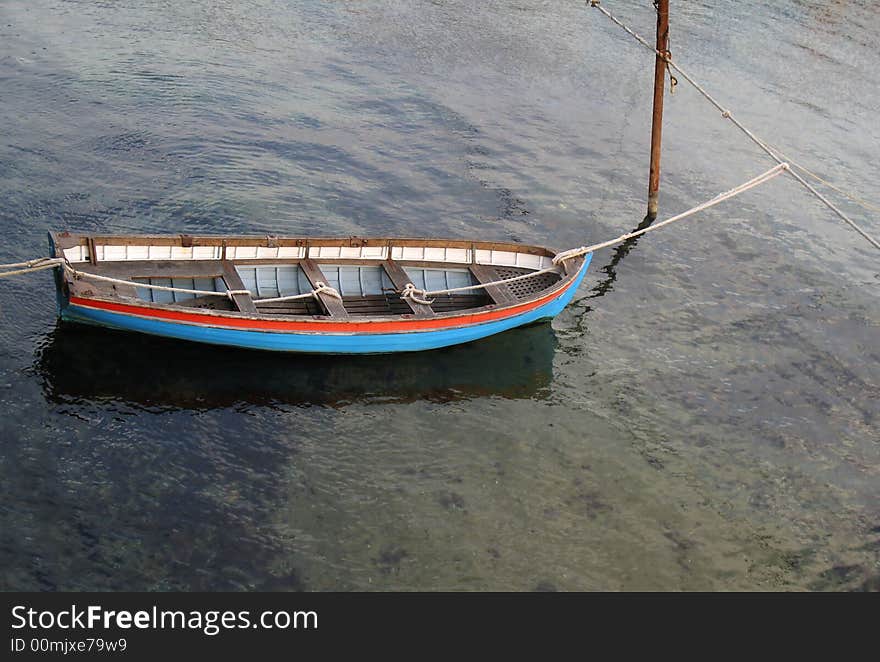 Wood lifeboat on a beach