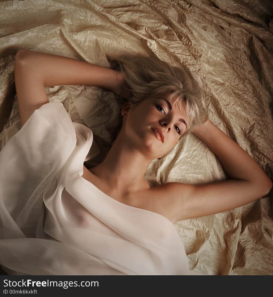 Girl Lying In A Bed