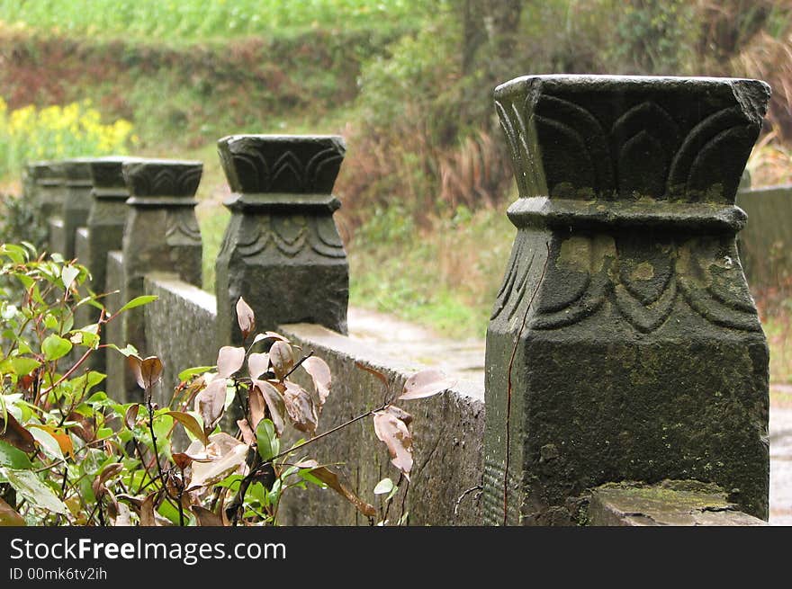 A old stone bridge right after rain, taken in china's countryside