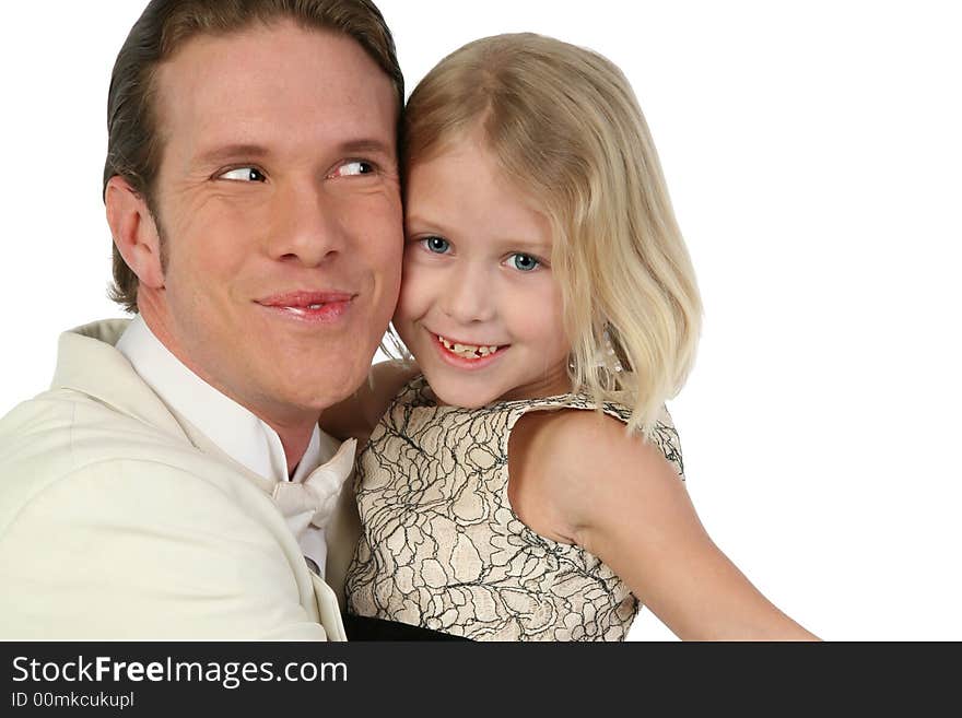 Father and daughter in formals hugging over white. Father and daughter in formals hugging over white.