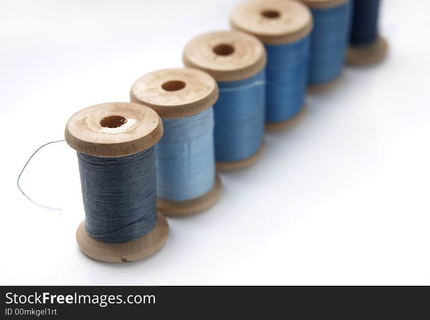 A blue colours range of blue and grey threads. A blue colours range of blue and grey threads