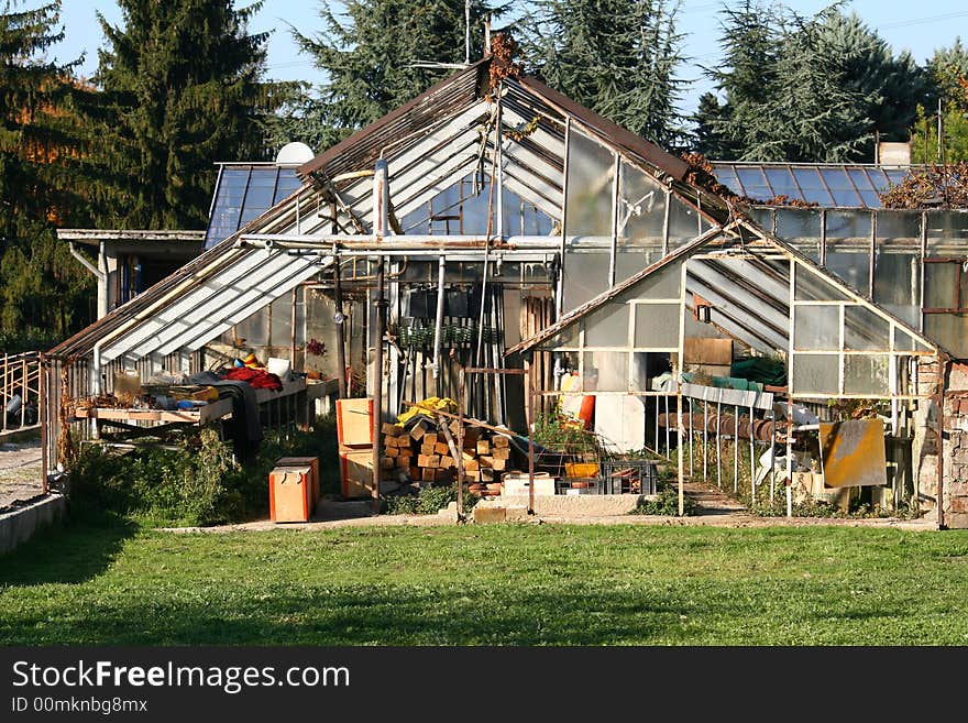 Old greenhouse in the farm in the country