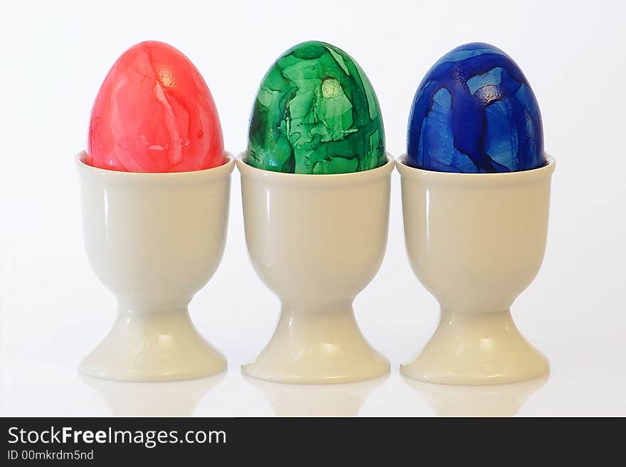 Three colourful easter eggs