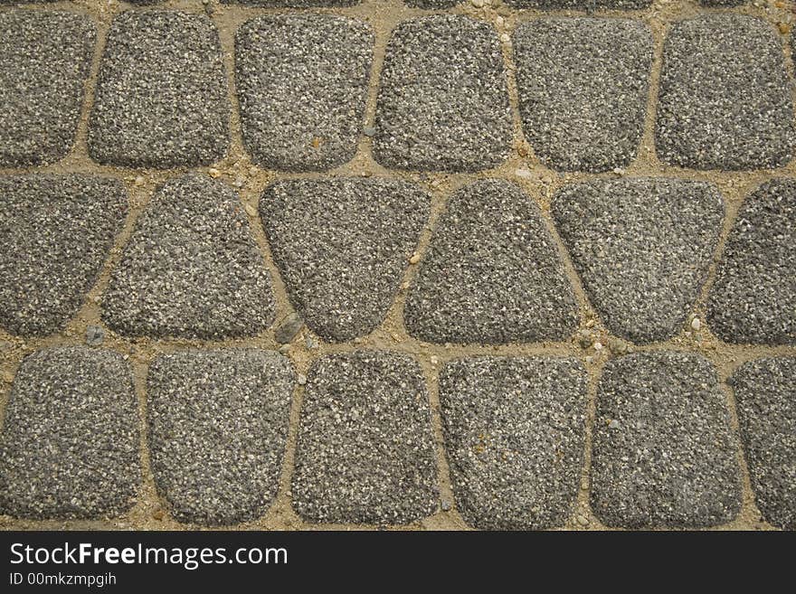 Texture of sidewalk ground of stones. Texture of sidewalk ground of stones