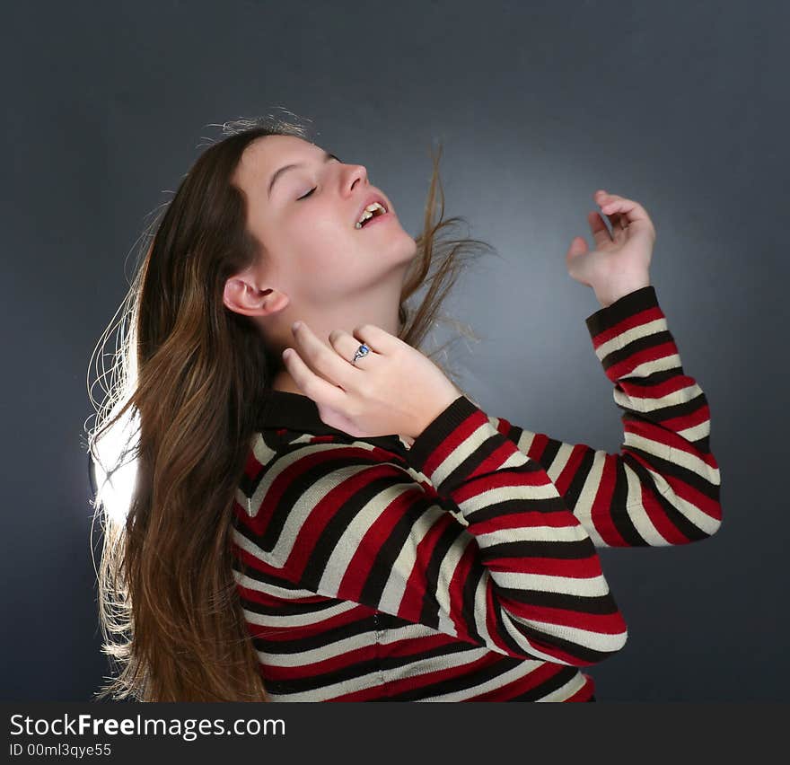 Young woman holding her hair up