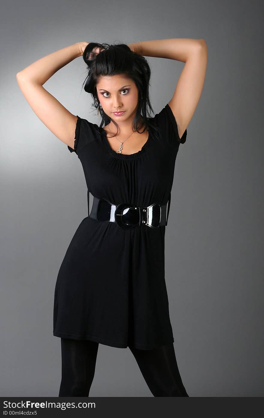 Young woman posing in a studio