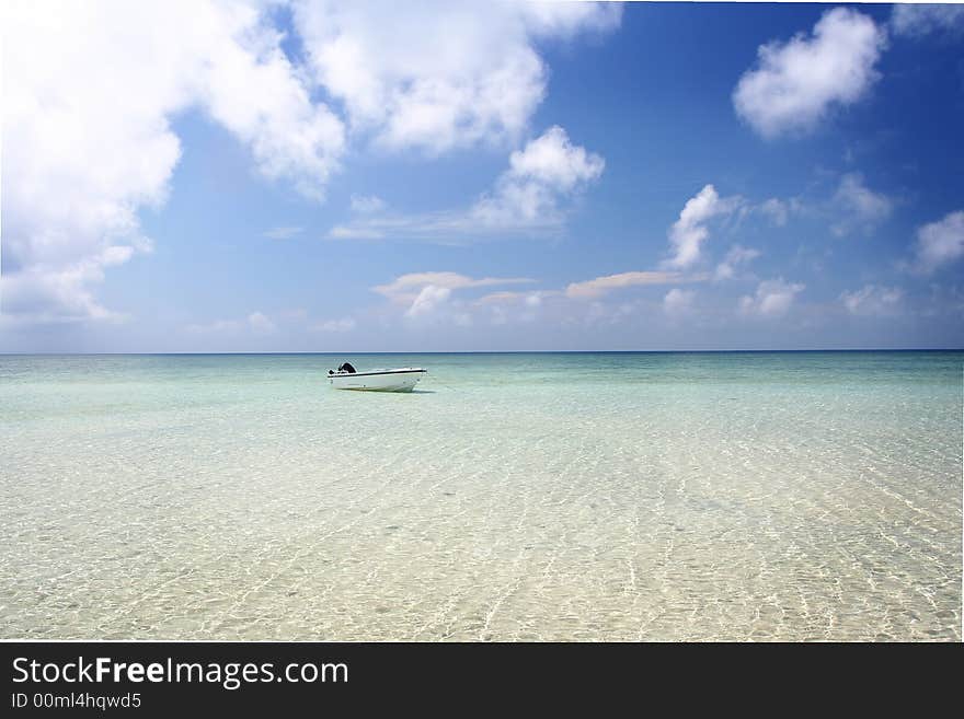 Sand, sea, sky and boat. Sand, sea, sky and boat