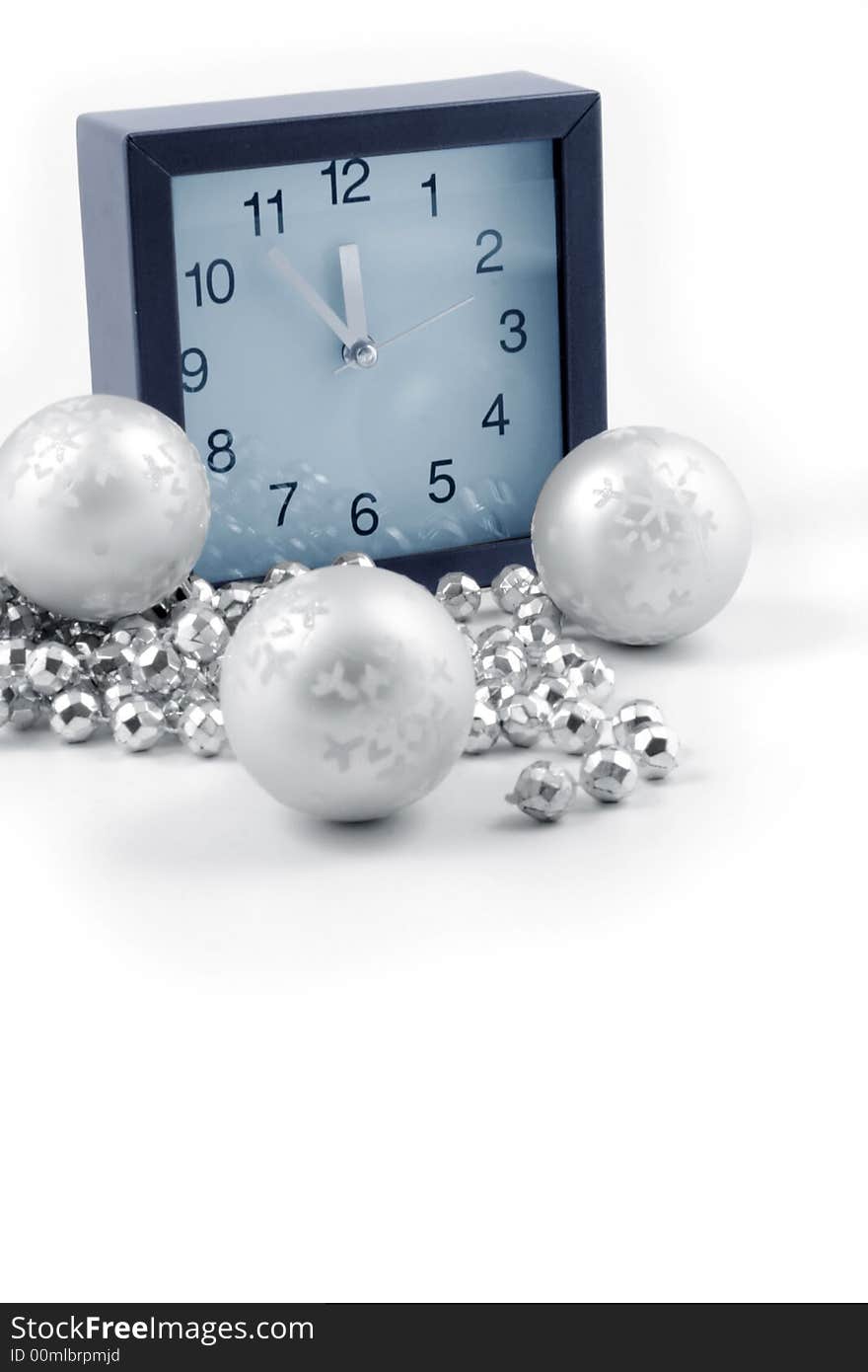 Christmas ball and clock on the white background. Christmas ball and clock on the white background.