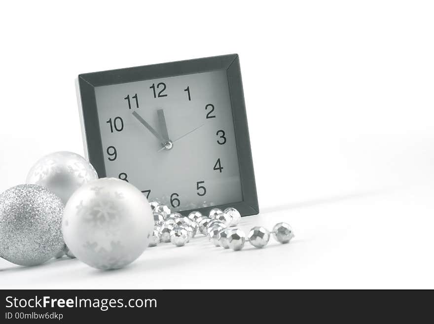 Christmas ball and clock on the white background. Christmas ball and clock on the white background.