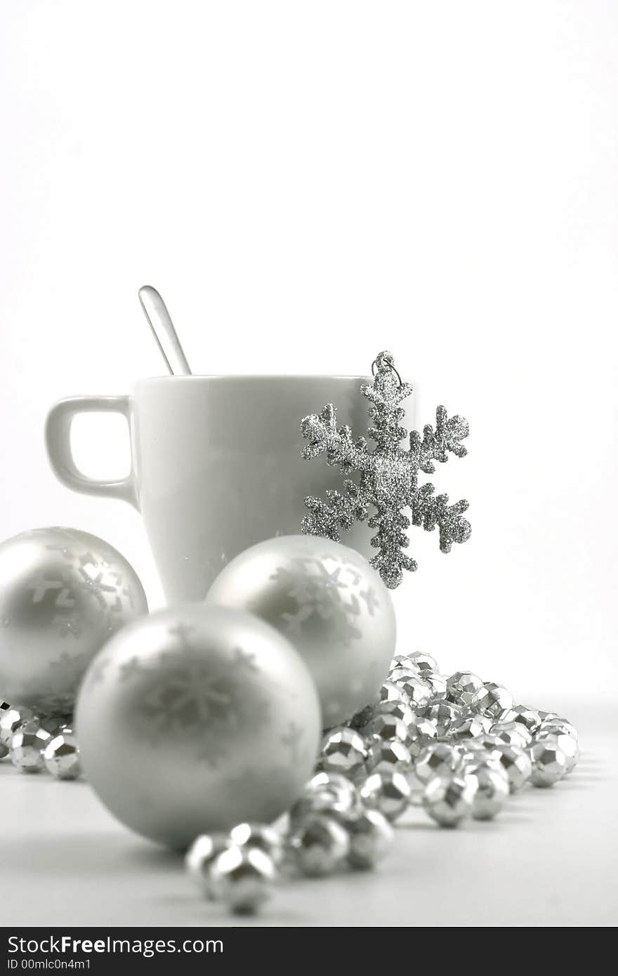 Christmas ball and cup on the white background. Christmas ball and cup on the white background.