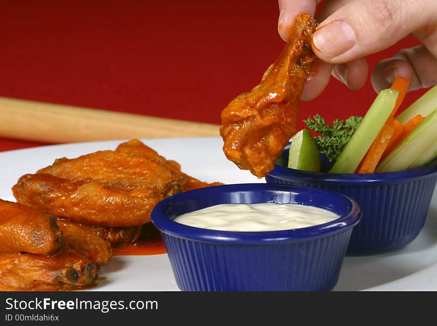 Delicious chicken wings with tartar sauce, ccopy space at top. Delicious chicken wings with tartar sauce, ccopy space at top