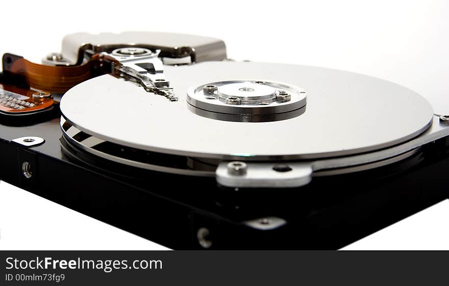 A close up of an isolated hard drive over white.