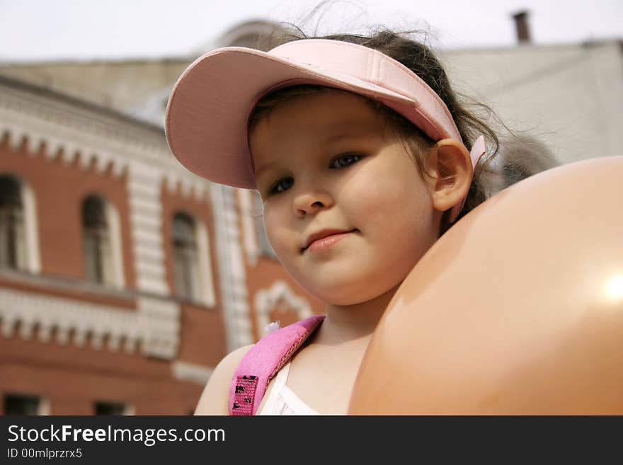 Little girl with airbaloon outdoor