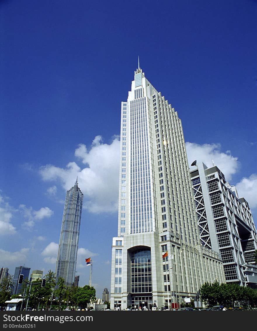 High-rises in Shanghai's new Pudong banking and business district, across the Huangpu river from the old city. High-rises in Shanghai's new Pudong banking and business district, across the Huangpu river from the old city.