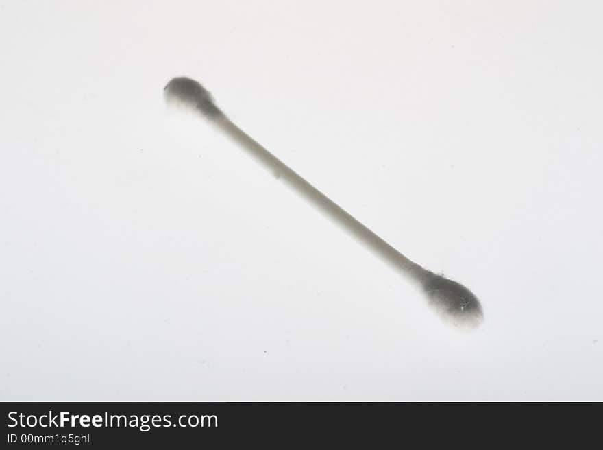 Sticks with cotton applicators for a make-up on a white background. Sticks with cotton applicators for a make-up on a white background