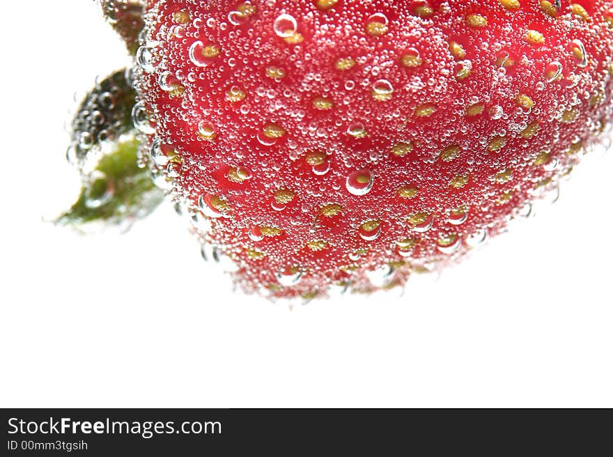 Bright red strawberry on a white background