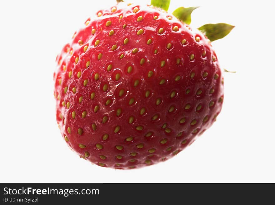 Bright red strawberry on a white background