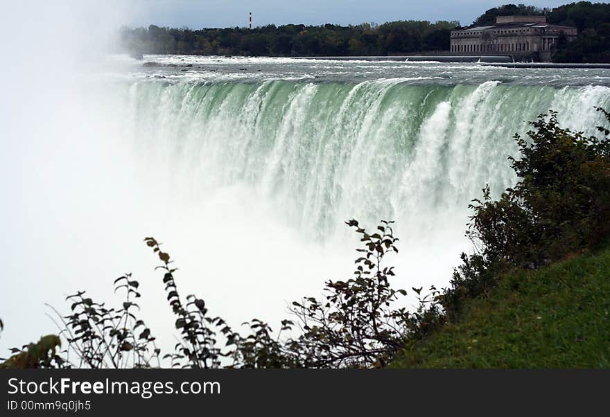 The Niagara Falls taken on a cloudy day.