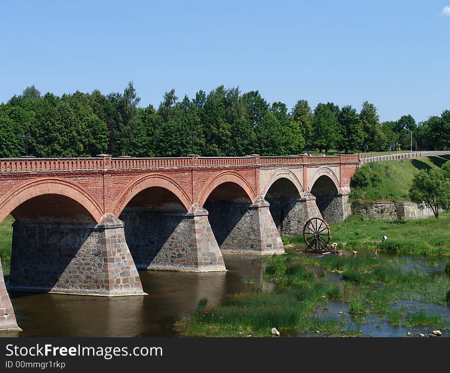 Old stone bridge with columns. Old stone bridge with columns