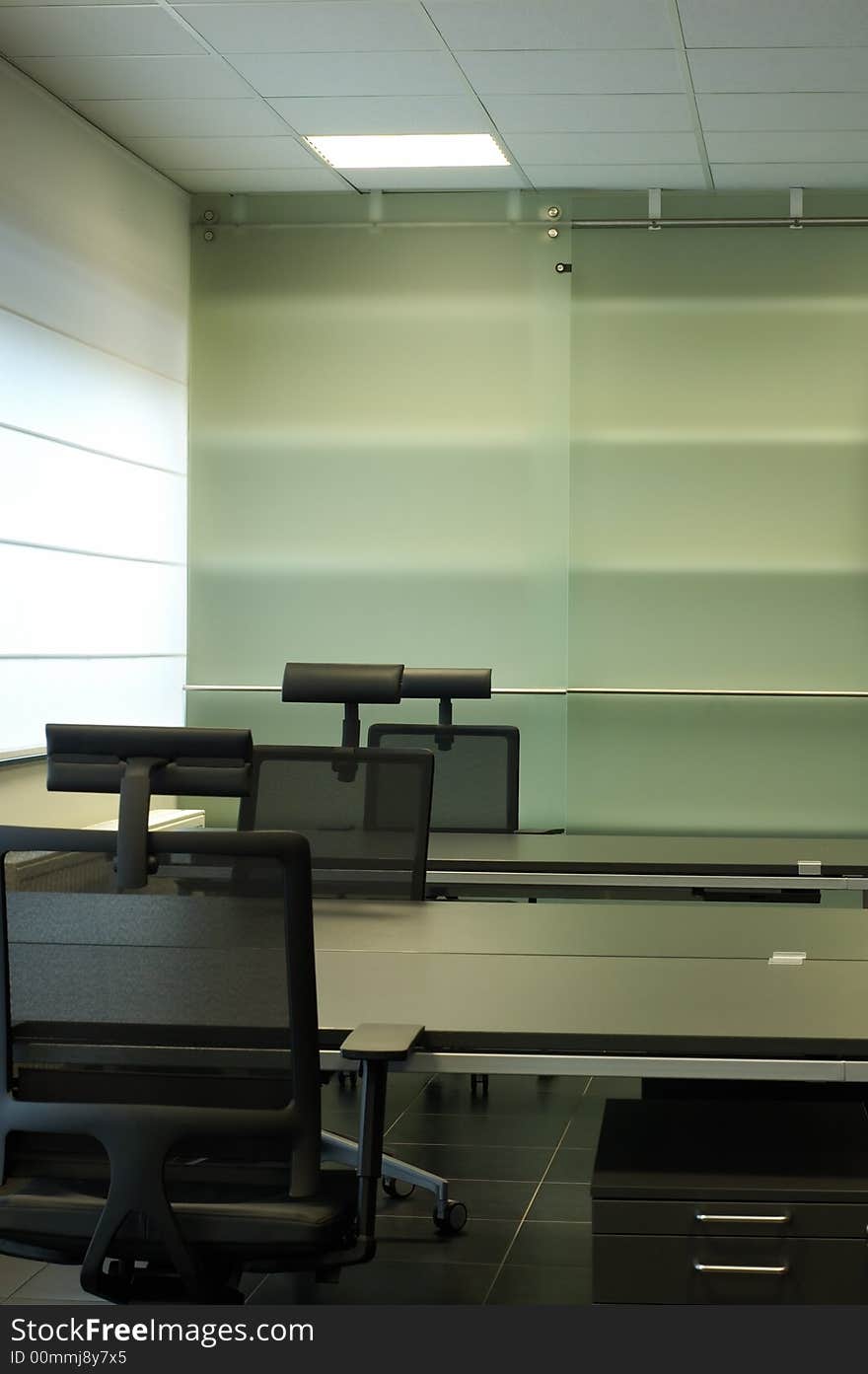 Image showing a clean, neat, black & modern desk. Image showing a clean, neat, black & modern desk.