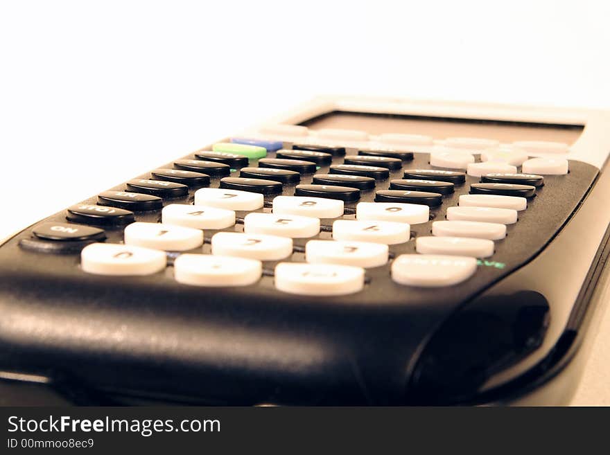 Macro view of a black graphing calculator. Macro view of a black graphing calculator