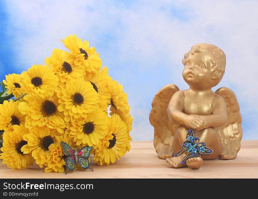 Flowers and Angel with Butterflies on Blue Sky Background