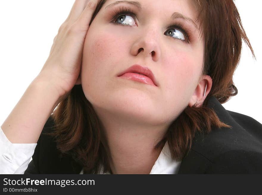 Close up of beautiful young business woman thinking.