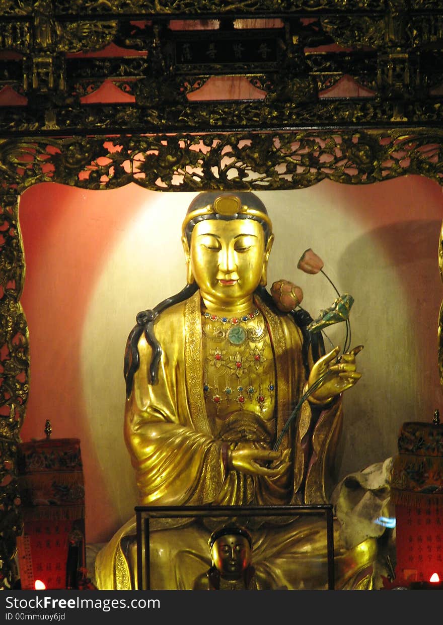 This is a Taiwanese stle bodhisattvas statue representing the compassionate aspect of the Buddha. This is a Taiwanese stle bodhisattvas statue representing the compassionate aspect of the Buddha.