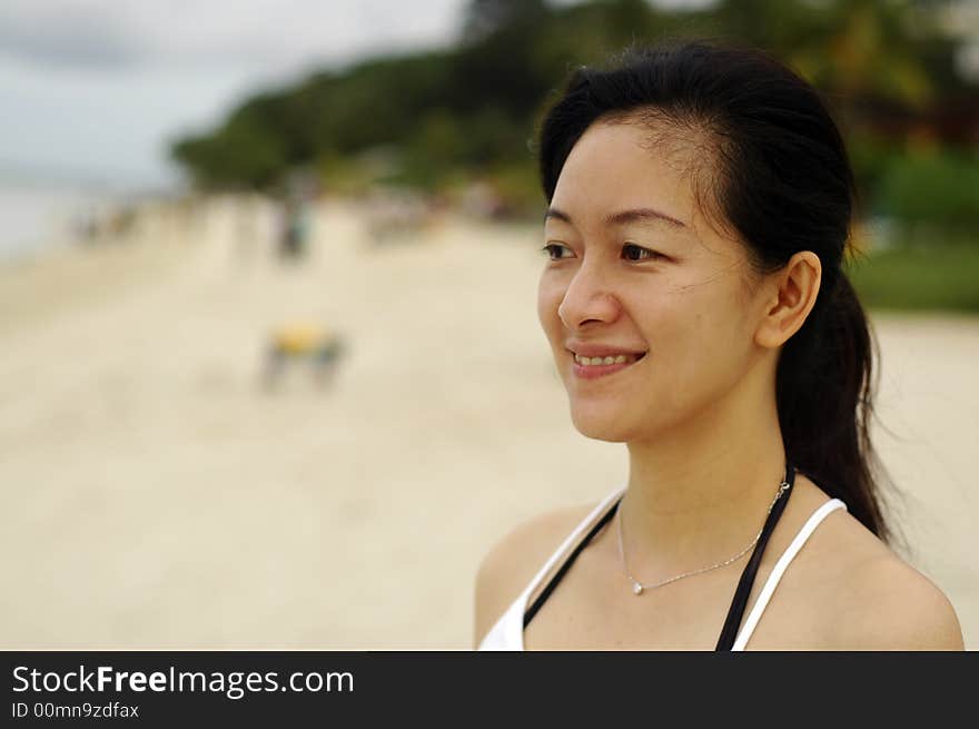 Chinese Lady At Beach