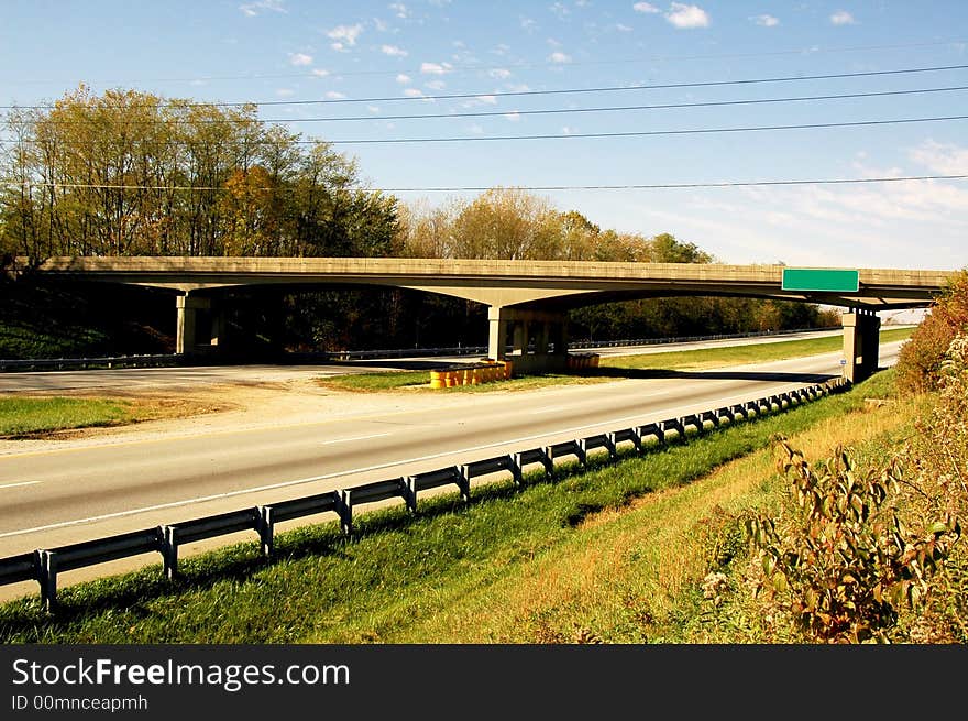 Bridge over the freeway in fall. Bridge over the freeway in fall.