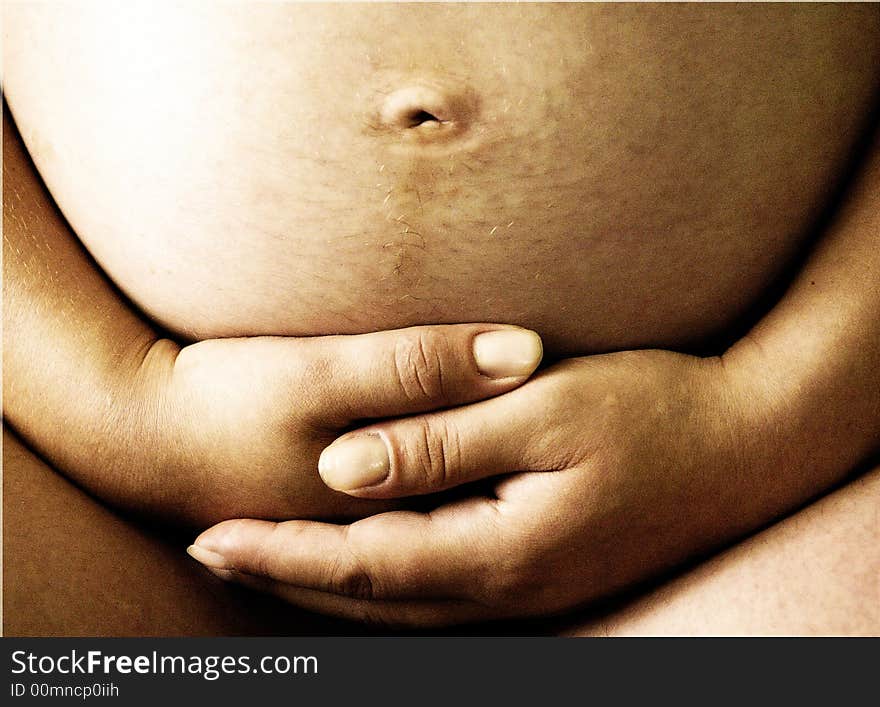 Pregnant Woman. Close-up Photo