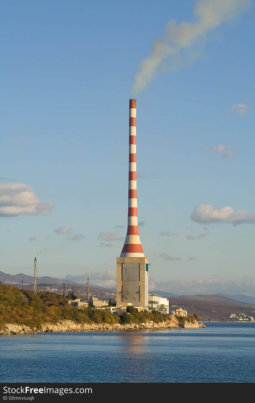 Hydroelectric power station and cloudy sky. Hydroelectric power station and cloudy sky