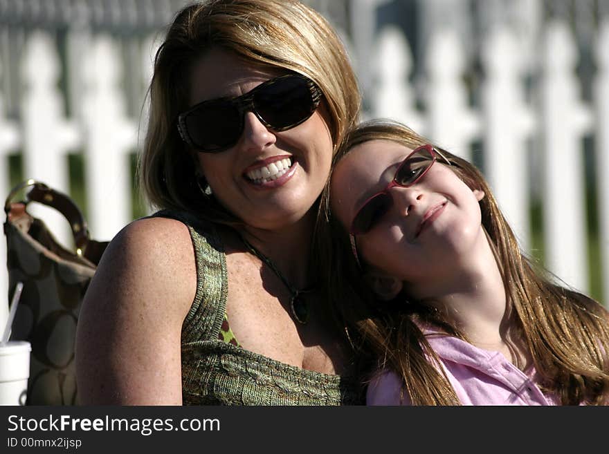 Mother And Daughter Smiling