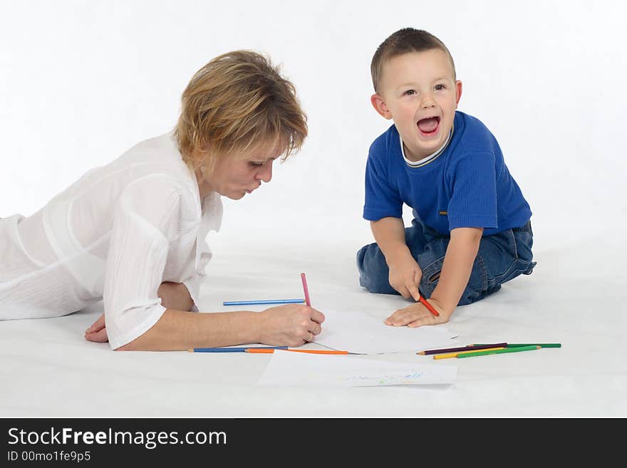 Woman and little boy drawing on the white background