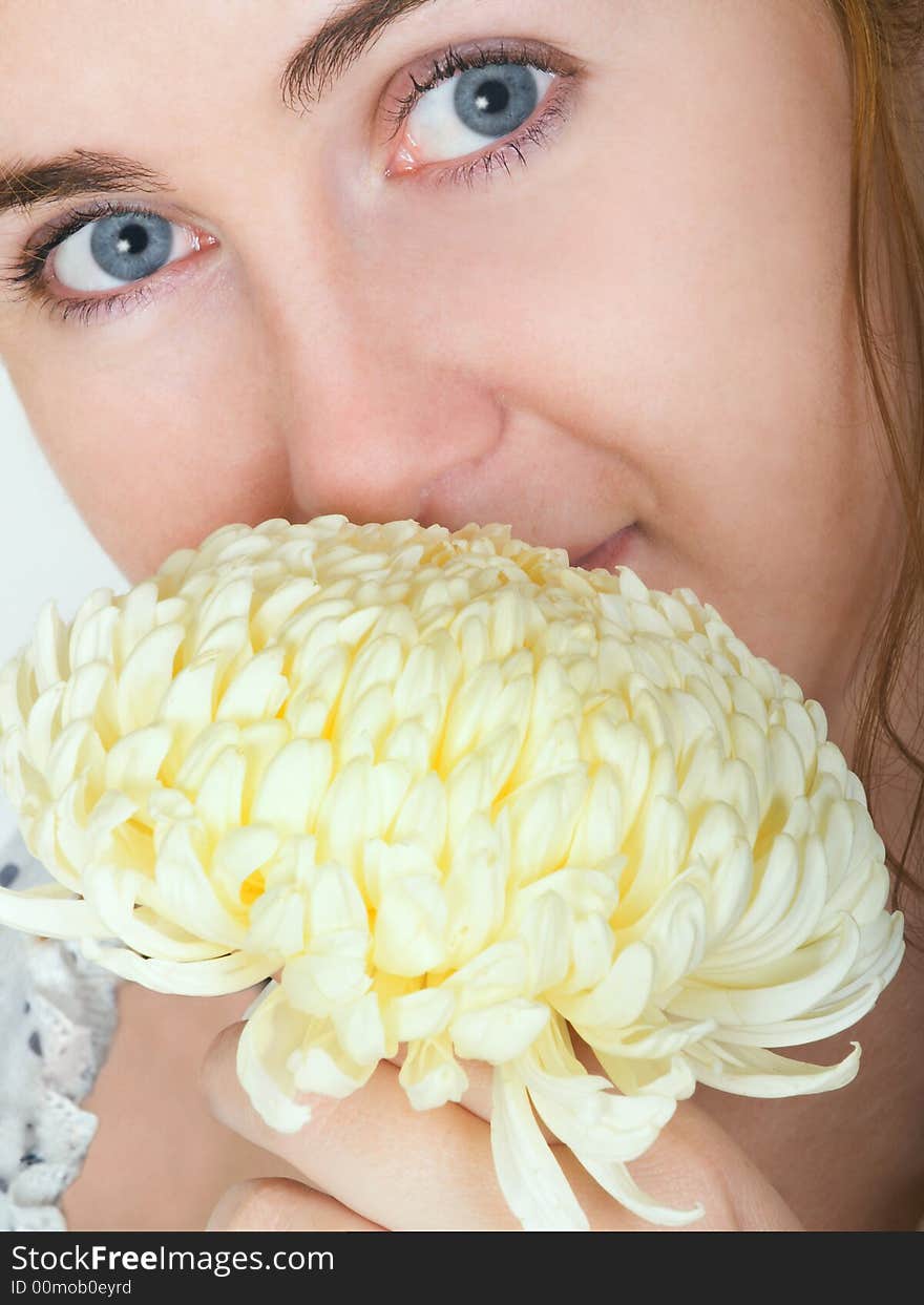 Portrait of a young girl with a flower. Portrait of a young girl with a flower