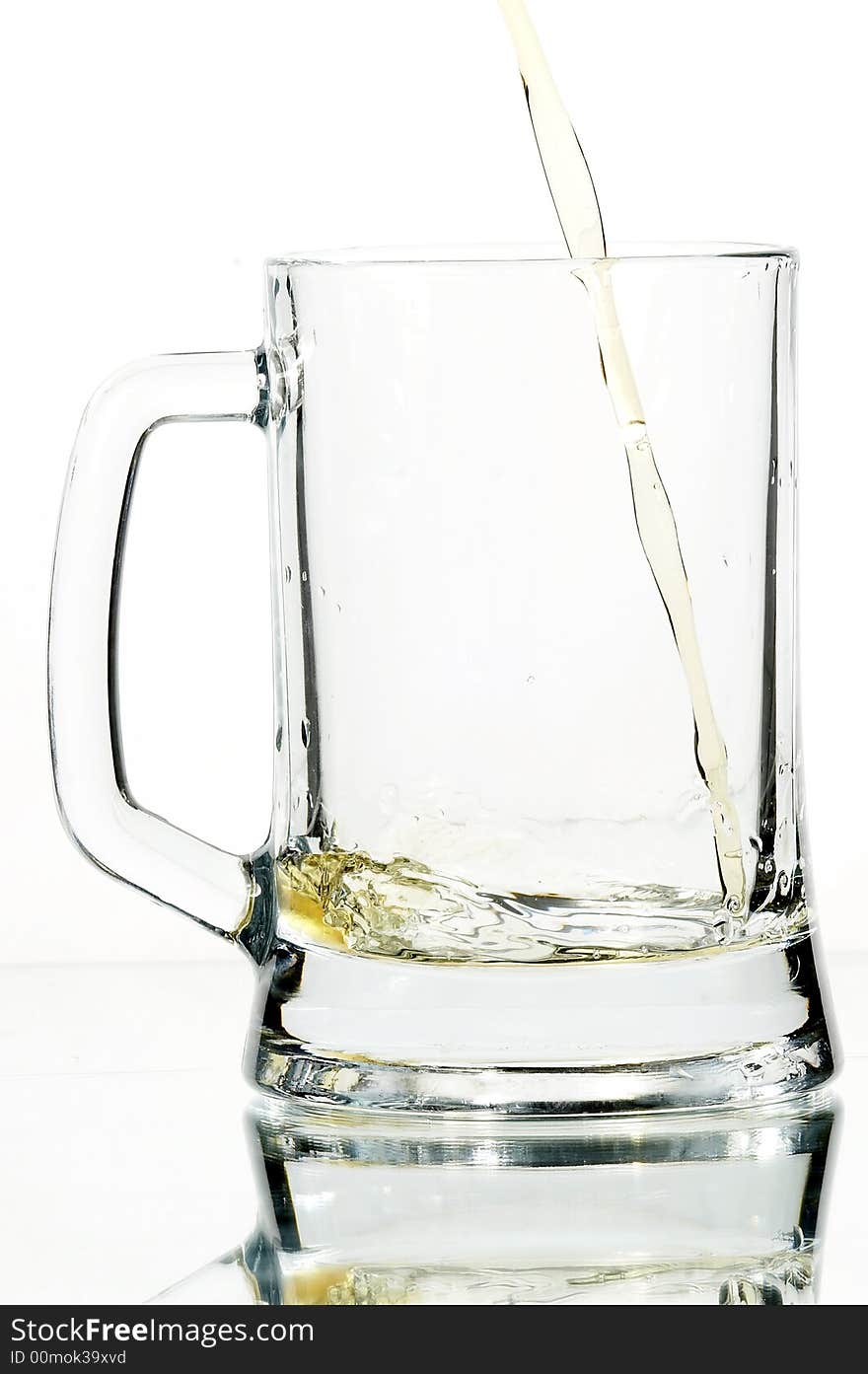 Beer in glass on the white background