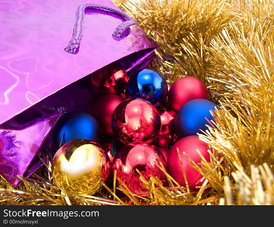 Christmas balls on golden background