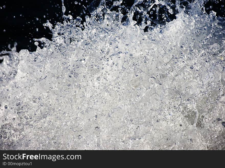 Splash of water on a dark background