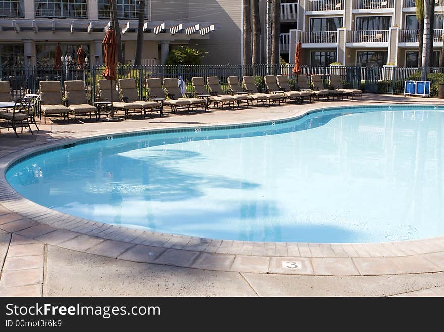 Hotel Pool With Chairs On The