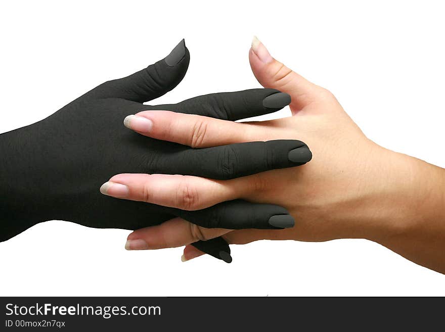 Two hands, one black and one white, with fingers interlaced. Two hands, one black and one white, with fingers interlaced.