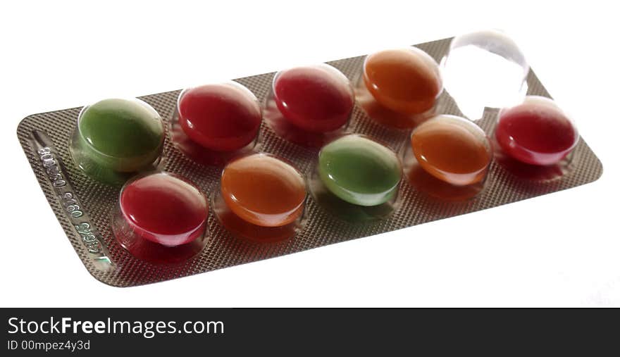 Tablets, pills color on a white background