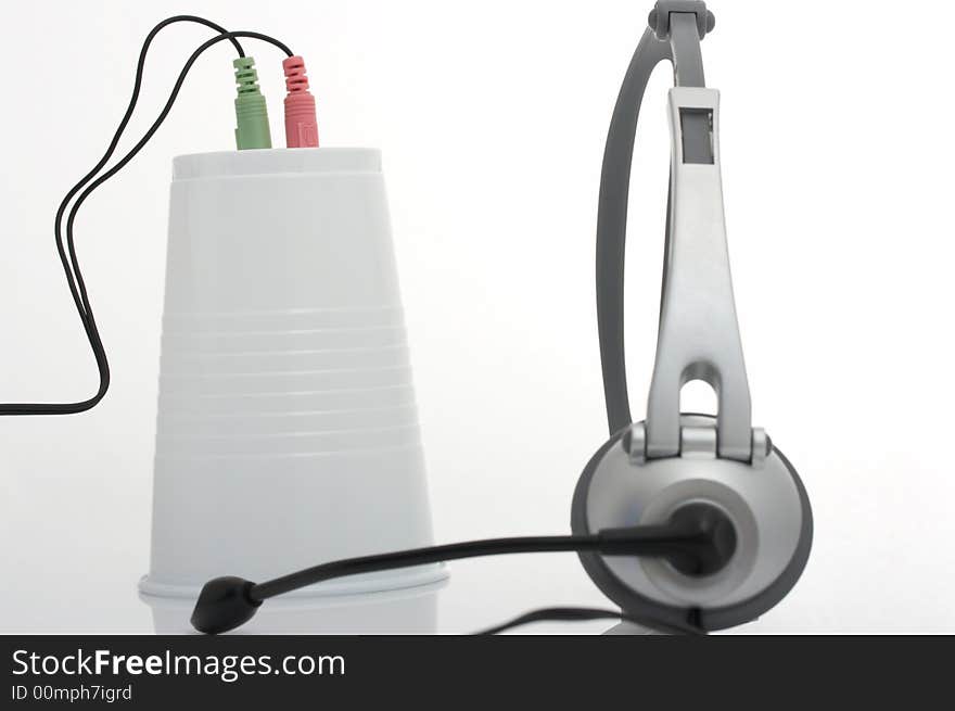 A computer headset over a white background