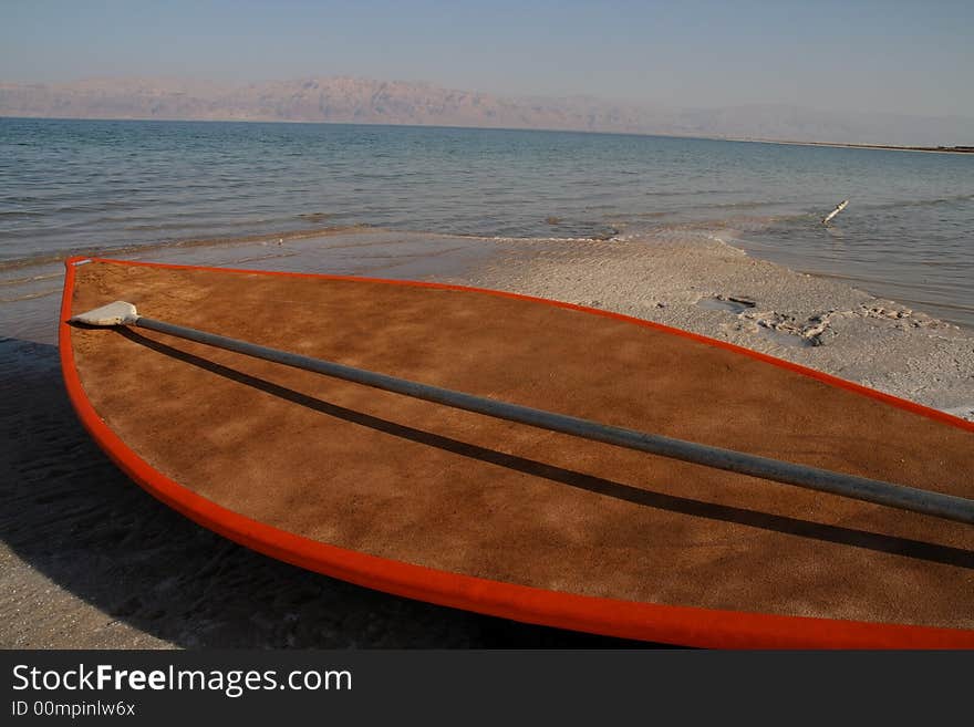 Boat on the shore of the Dead Sea